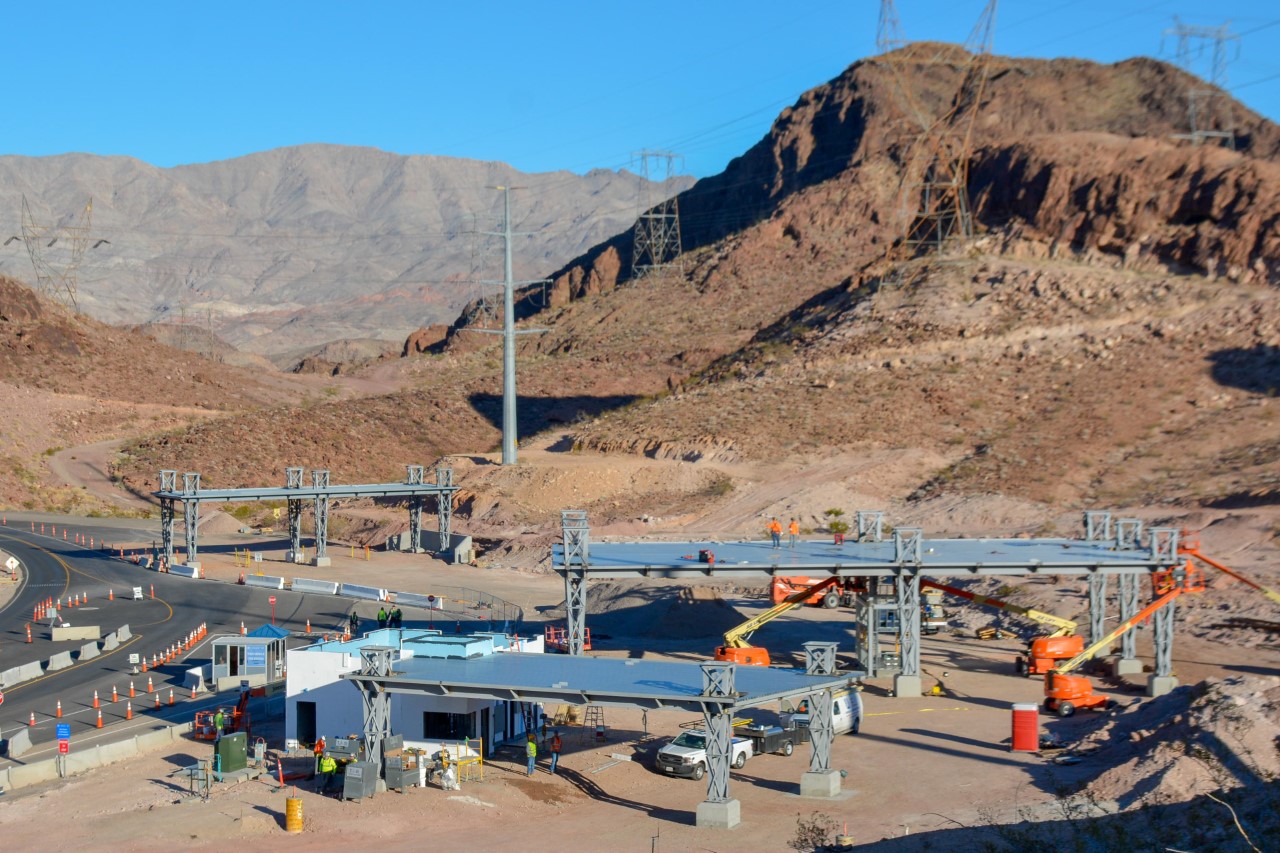 The new checkpoint includes a permanent security guard station and multiple entrance lanes.